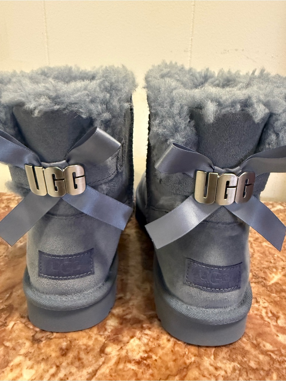 UGG Kids Shearling Boot with Ribbon Bow in Light Blue